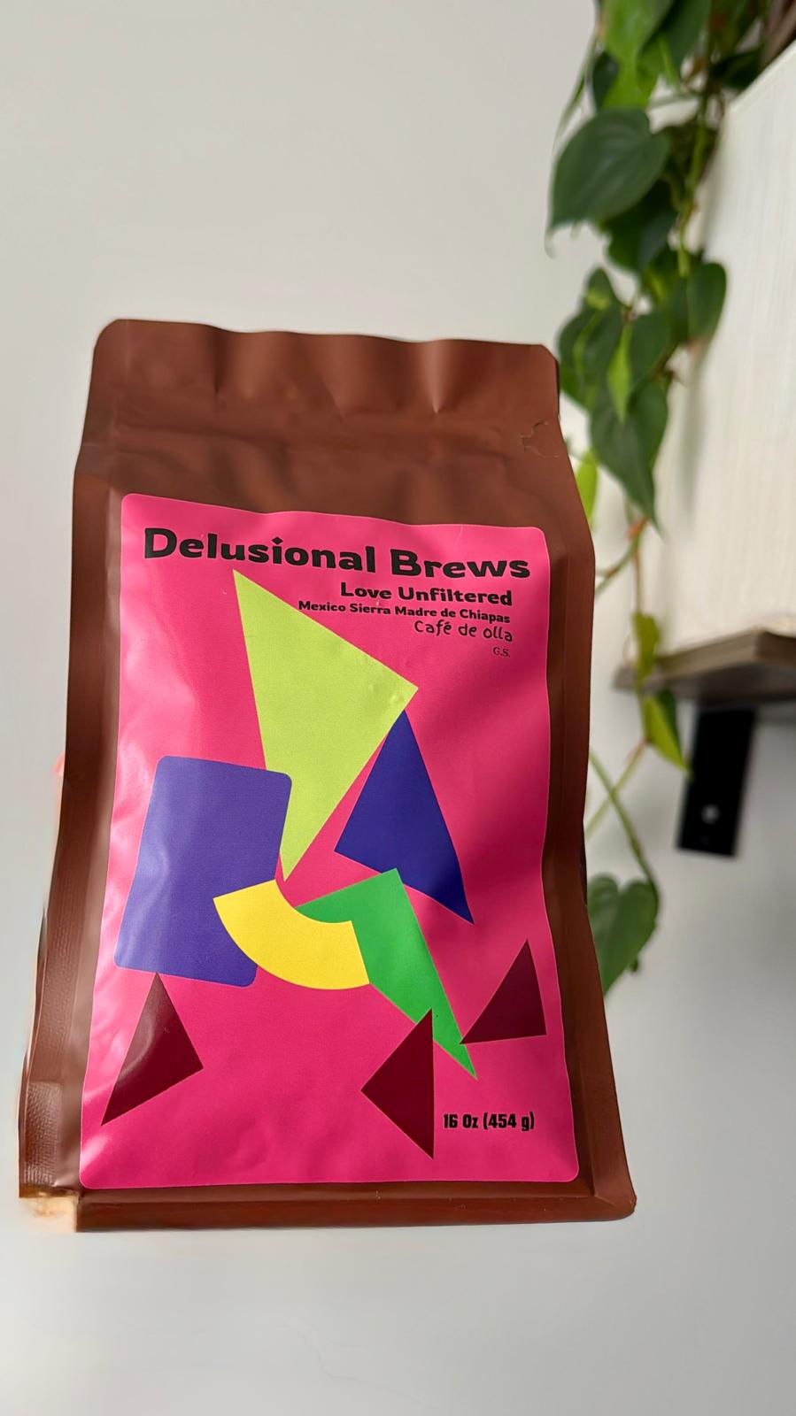 Coffee package with colorful design on a white surface